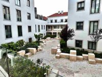 Thumbnail photo of apartment complex linking to Apartment photo page